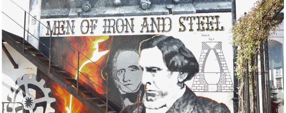 A mural in the town of Coleford, Gloucestershire, commemorates iron and steel innovators, father and son David and Robert Mushet.